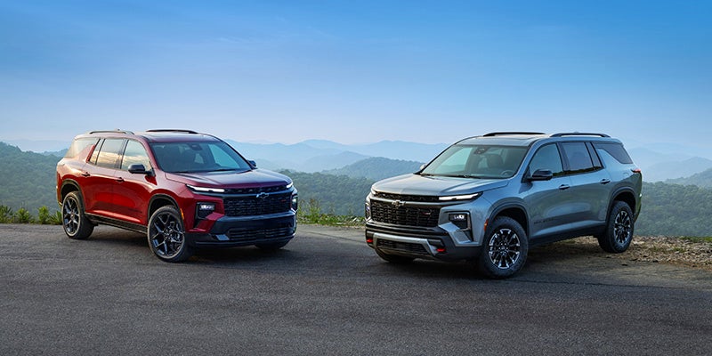 A red and silver 2024 Chevrolet Traverse lineup